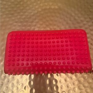 Christian Louboutin wallet in hot pink